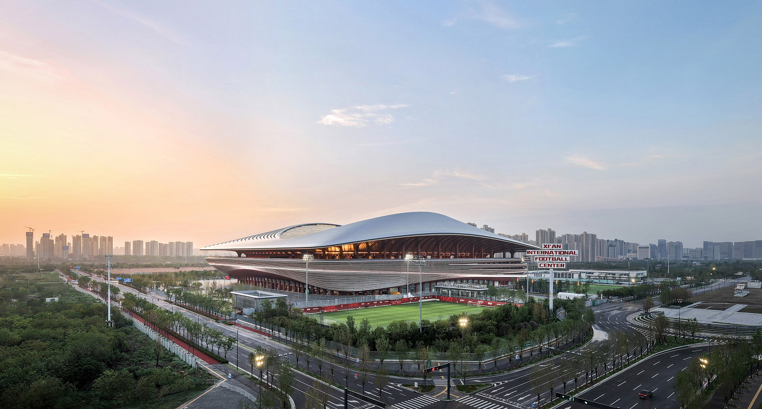 Zaha Hadid Architects построила стадион в форме седла в китайском Сиане